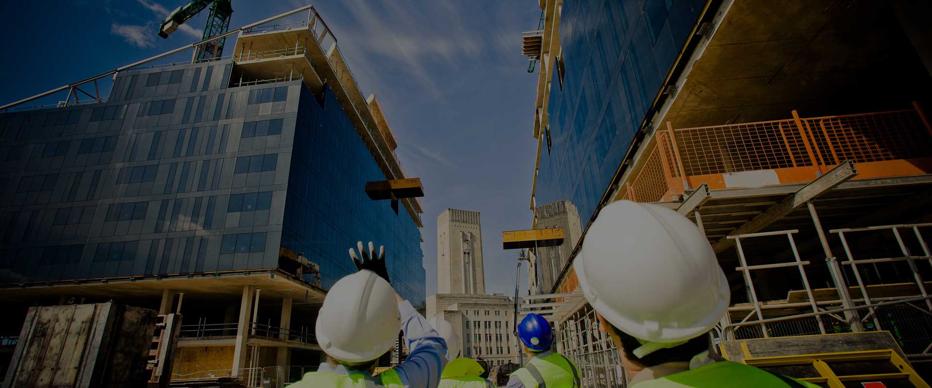 Engineers discussing about the concrete construction project